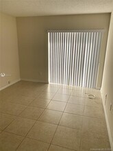 7727 SW 86th St-Unit -A1-311 in Miami, FL - Building Photo - Building Photo