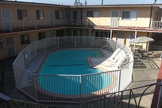 Stone Arbor on Benedict Apartments in Downey, CA - Building Photo - Building Photo