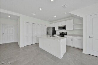 14273 Oviedo Pl in Tice, FL - Building Photo - Building Photo