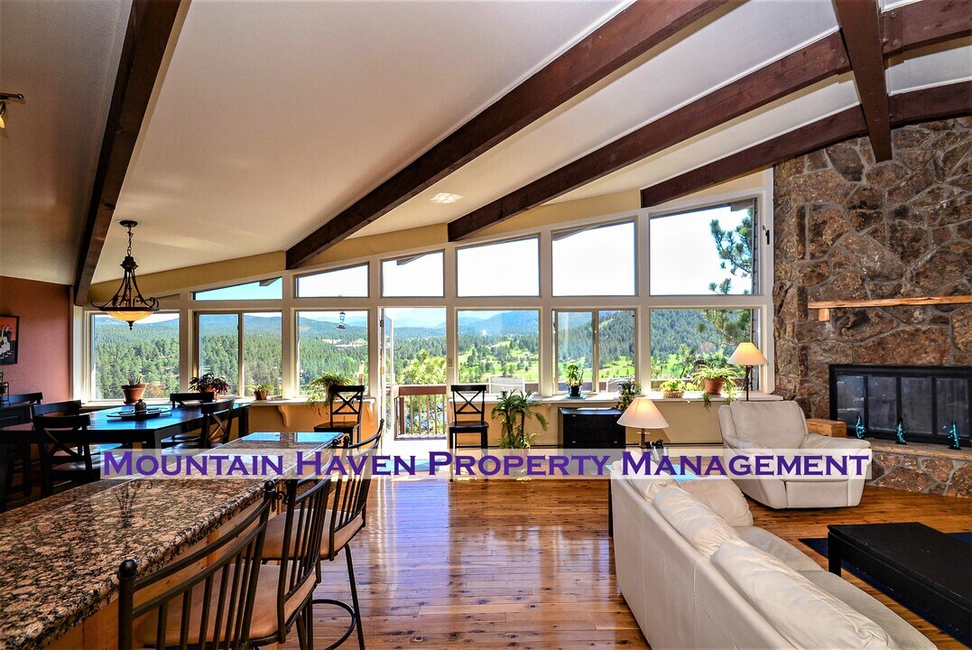 28606 Evergreen Manor Dr in Evergreen, CO - Building Photo