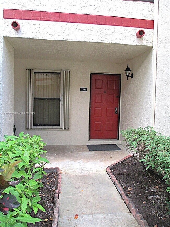 property at 11532 NW 10th St