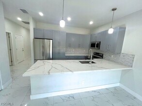 398 Pennfield Ave in Lehigh Acres, FL - Building Photo - Building Photo