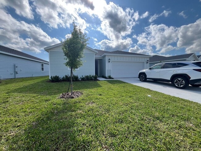 16 Wandering Crk Wy in Palm Coast, FL - Foto de edificio - Building Photo