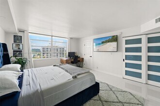 1050 93rd St, Unit 7H in Bay Harbor Islands, FL - Building Photo - Building Photo