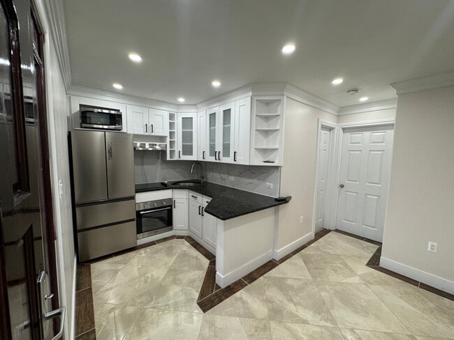 property at 164-37-164-95 95th St
