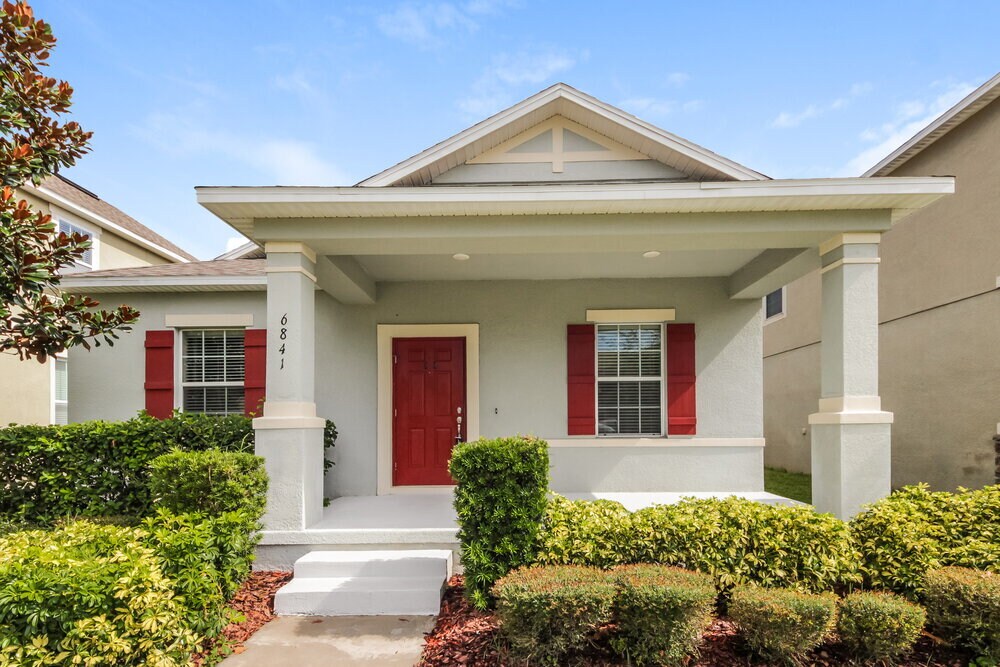 6841 Goldflower Ave in Harmony, FL - Foto de edificio