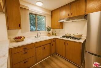 12958 Valleyheart Dr in Los Angeles, CA - Building Photo - Building Photo