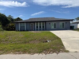 1249 Joplin Ave NW in Port Charlotte, FL - Building Photo