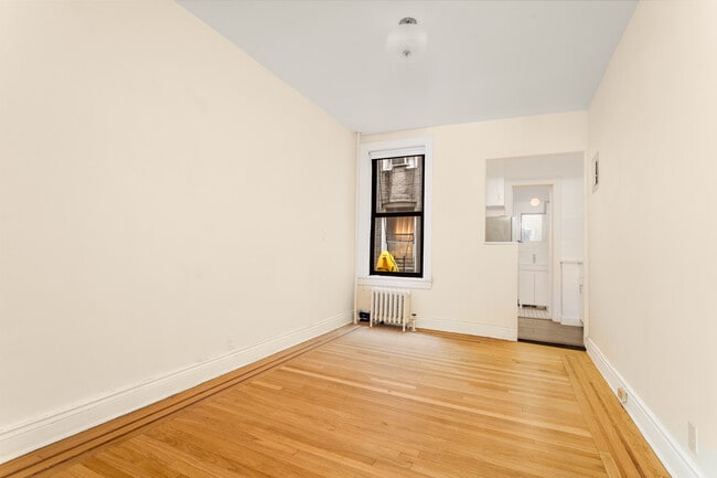 property at 52-25 Skillman Ave