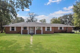 209 Moss Hill Ln in Conroe, TX - Foto de edificio - Building Photo