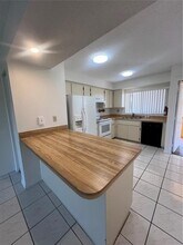 1330 Rio De Janeiro Ave in Port Charlotte, FL - Building Photo - Building Photo
