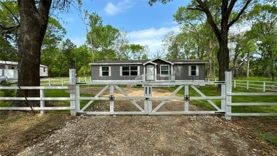 7865 Pinecone Ln in Plantersville, TX - Building Photo - Building Photo