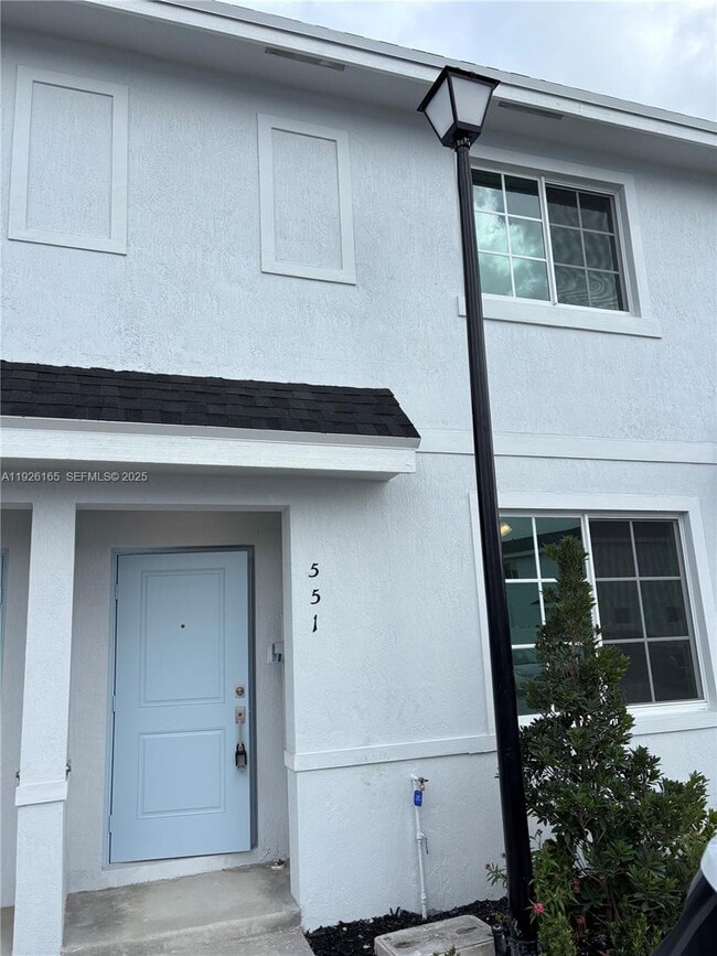 property at 551 NW 10th Ct