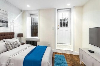 39 E 1st St in New York, NY - Building Photo - Building Photo