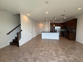 2-bedroom, 2.5-bath townhome located in Ea in Orlando, FL - Building Photo - Building Photo