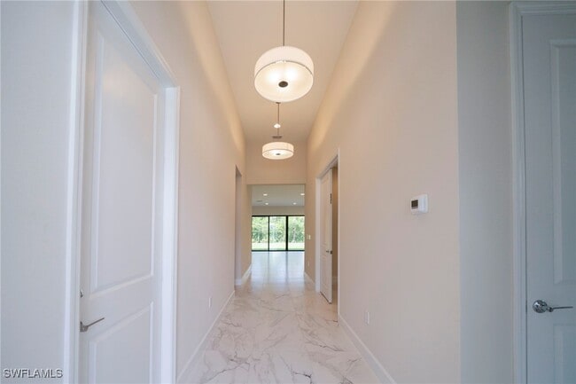21024 Teak Tree Ter in Estero, FL - Building Photo - Building Photo