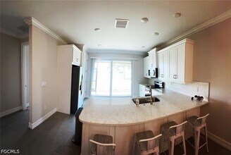 16790 Seasons Coast Dr in Bonita Springs, FL - Building Photo - Building Photo