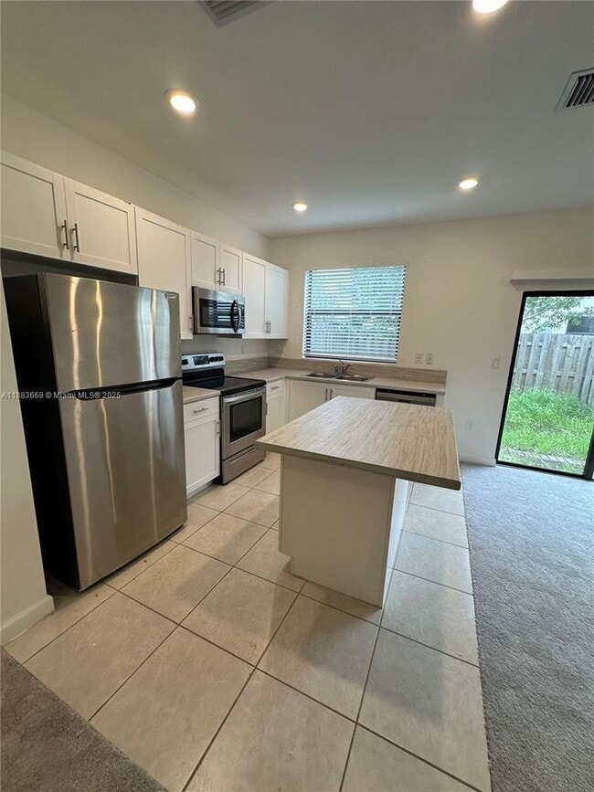 property at 21430 NE 3rd Pl