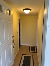 21 Polly Pl, Unit apartment in Huntington, NY - Building Photo - Building Photo