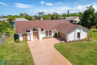 2451 SE Shell Ave in Port St. Lucie, FL - Building Photo - Building Photo