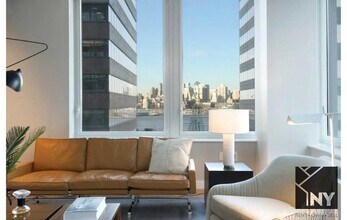 180 John St, Unit 1410 in New York, NY - Building Photo - Building Photo