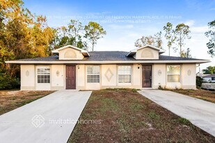 2422 Joe Ave S, Unit 1 in Lehigh Acres, FL - Building Photo