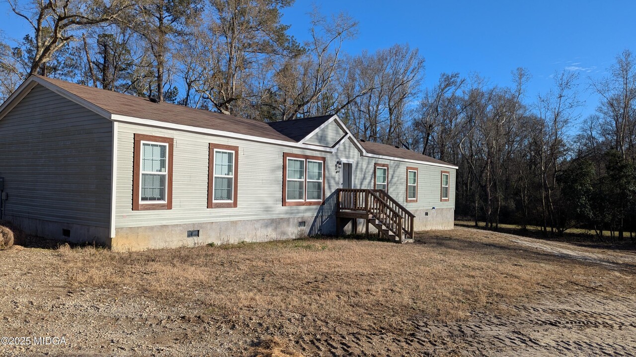 7100 Knoxville Rd in Lizella, GA - Building Photo