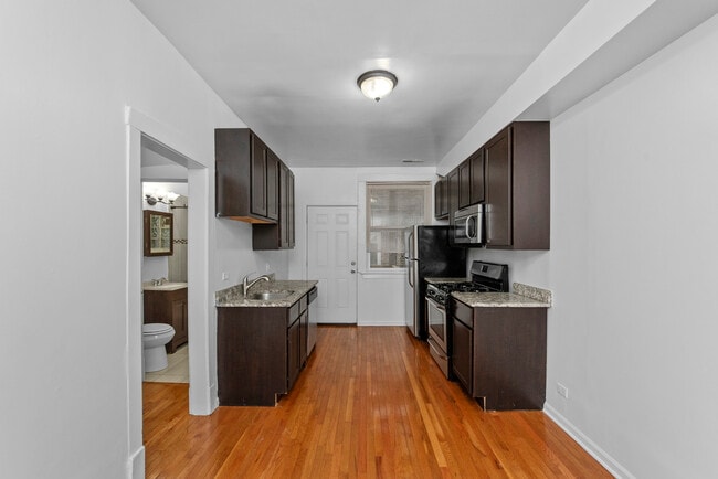 3753 W Sunnyside Ave, Unit #  01 in Chicago, IL - Building Photo - Building Photo