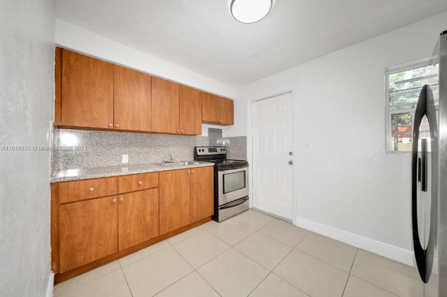 property at 5545 NW 3rd Ave