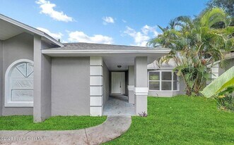 614 Elmont St NW in Palm Bay, FL - Building Photo