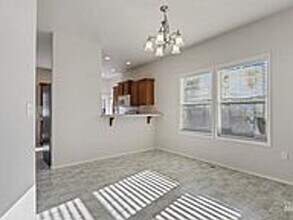 9948 W Sleepy Hollow Ln in Garden City, ID - Building Photo - Building Photo