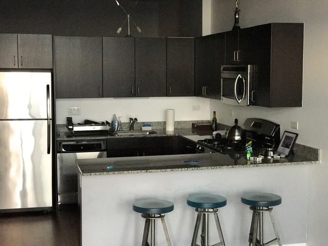 property at 235 W Van Buren St