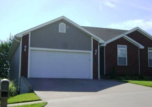 property at 1120 SW Red Oaks Ct