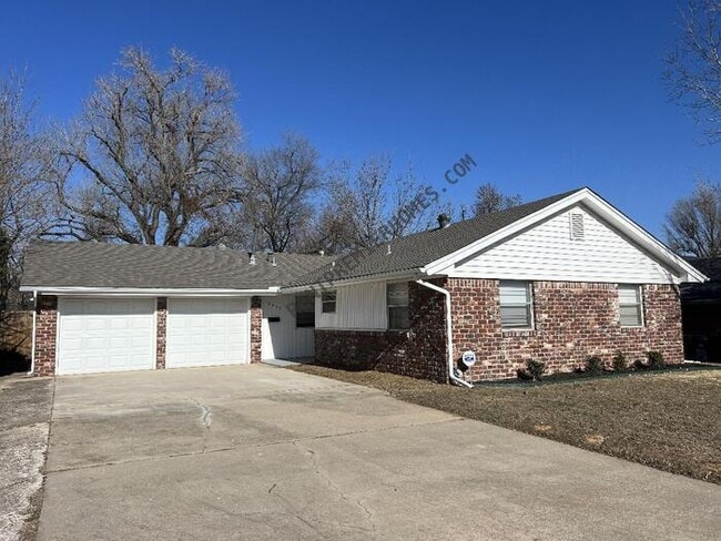 property at 4413 NW 12th St