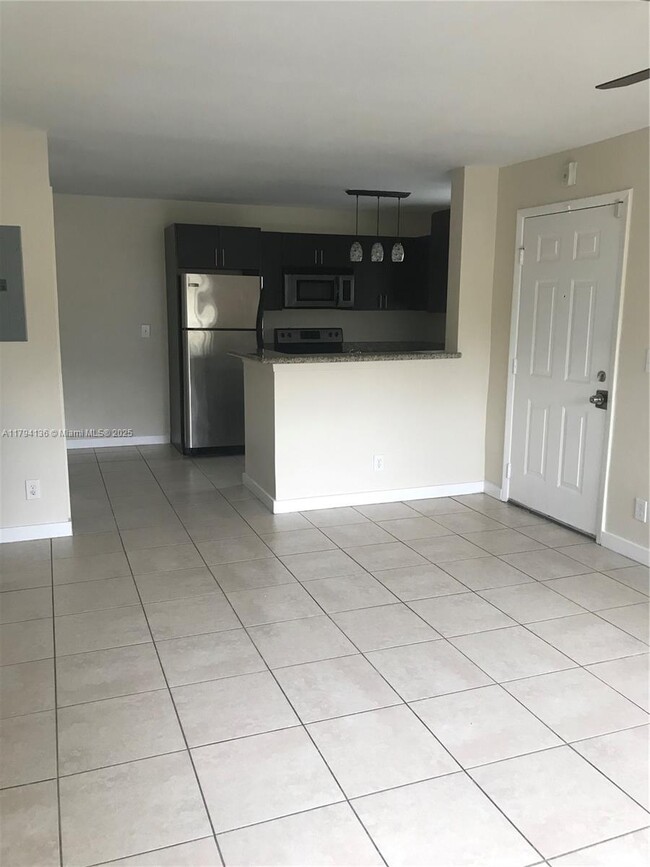 4088 N Pine Island Rd, Unit 400 in Sunrise, FL - Building Photo - Building Photo