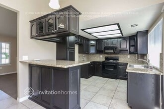 11642 Queensborough St in Riverside, CA - Building Photo - Building Photo