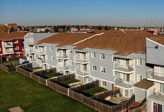 The Courtyards Apartments in Grande Prairie, AB - Building Photo - Building Photo