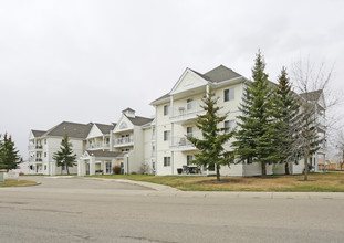 Woodside Place Condominiums in Airdrie, AB - Building Photo - Building Photo