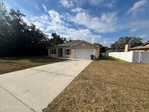 1159 MacFarlane Ave in Spring Hill, FL - Building Photo - Building Photo