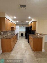 7302 NW 57th Ct in Tamarac, FL - Building Photo - Building Photo