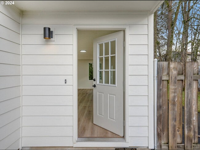 property at 902 NE Hacienda Ct