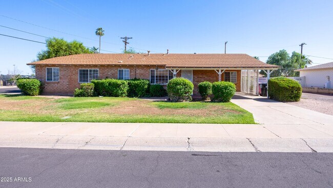 property at 7337 E Lewis Ave