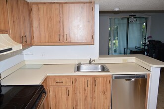 5570 NW 44th St, Unit 306A in Lauderhill, FL - Building Photo - Building Photo