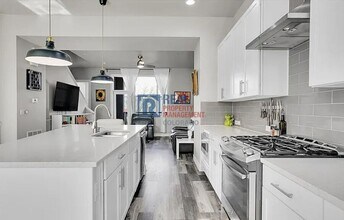 7040 W Alaska Dr in Lakewood, CO - Building Photo - Building Photo