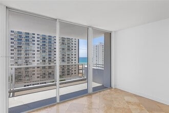 5700 Collins Ave in Miami Beach, FL - Building Photo - Building Photo