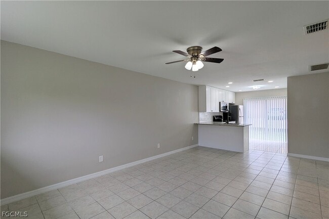 property at 427 NE Pine Island Ln