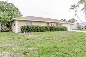 6713 Riparian Rd in Atlantis, FL - Foto de edificio - Building Photo