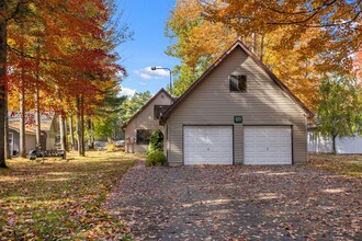 8015 Aarwood Trl NW, Unit Gorgeous Torch River 3 in Rapid City, MI - Building Photo - Building Photo