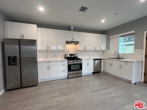 6833 Lubao Ave in Los Angeles, CA - Building Photo - Building Photo