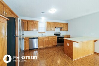 315 E Elm St in Raymore, MO - Foto de edificio - Building Photo